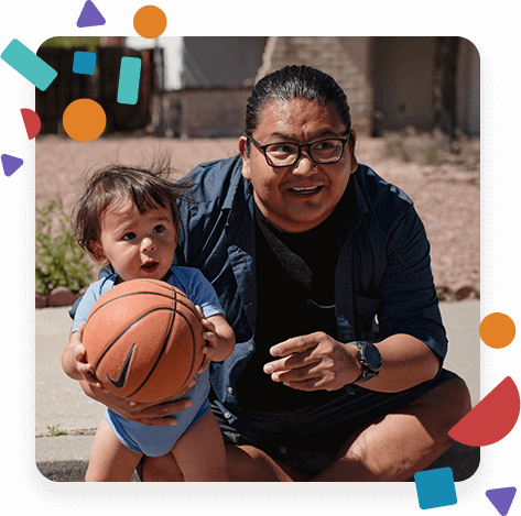 Decorative photo of Byrickson playing basketball with a toddler.