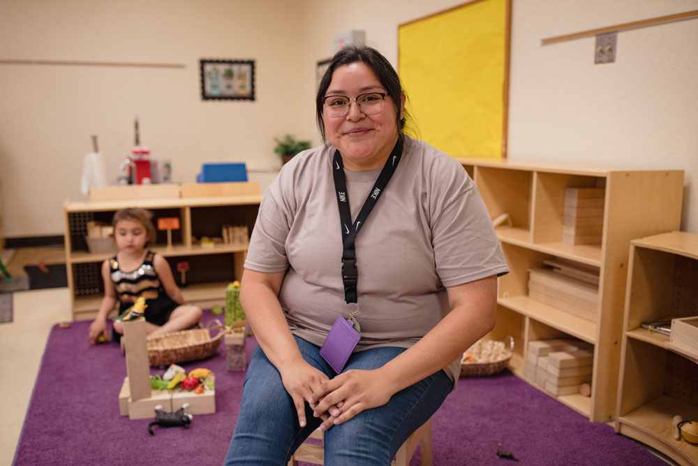 PreK educator Mikila Crespin poses in her classroom